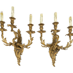 Appraisal: A Pair of Louis XV Style Gilt Bronze Three-Light Wall