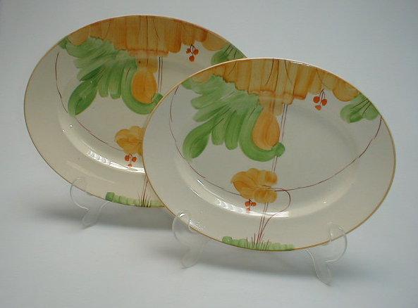 Appraisal: Two graduated hand painted 's style meat plates