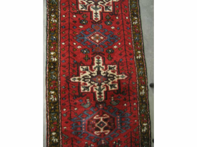 Appraisal: Heriz Persian Handmade Runner medallions on red field ' x