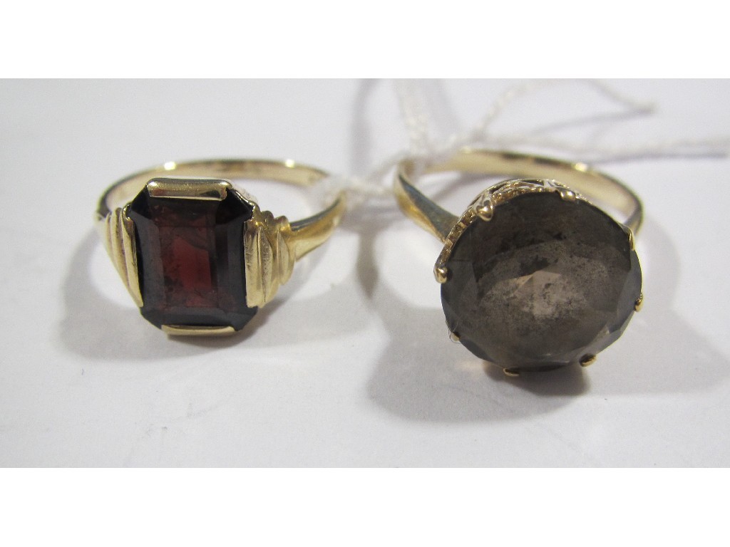 Appraisal: Two ct gold single stone ring one with garnet the