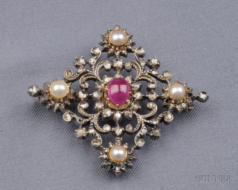 Appraisal: Antique Ruby and Diamond Brooch centering a ruby cabochon set