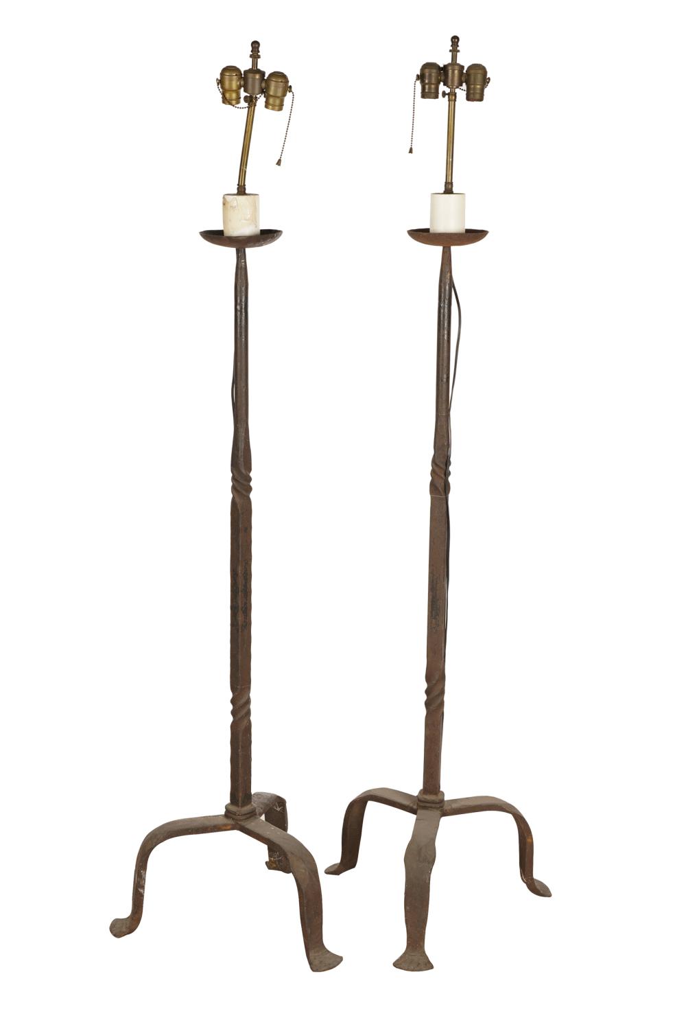 Appraisal: PAIR OF SPANISH IRON TORCHIERESeach on tripod feet Condition one