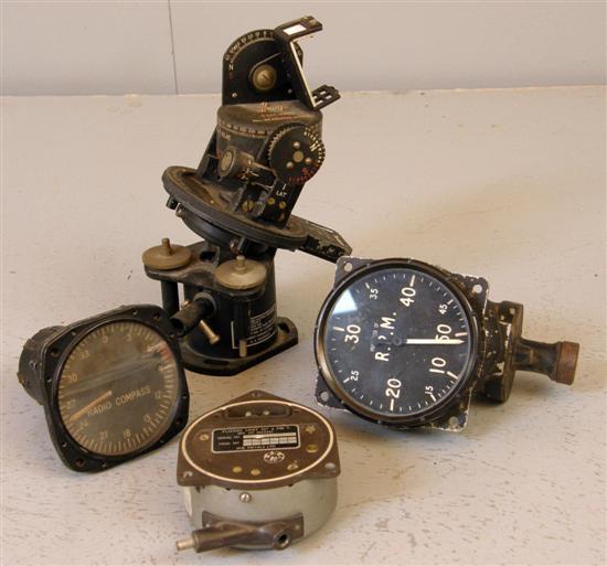 Appraisal: Four World War II Aircraft cockpit instruments Standard- Astro compass