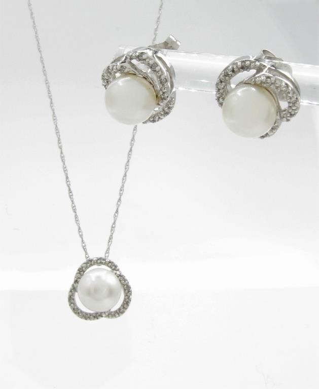 Appraisal: A K white gold pendant featuring a mm cultured pearl