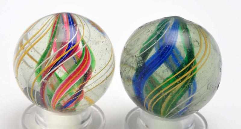 Appraisal: Lot of Divided Core Swirl Marbles Description Includes two multicolored