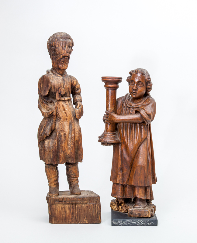 Appraisal: MEDIEVAL STYLE CARVED WOOD FIGURE CARRYING A COLUMN Together with