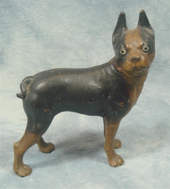 Appraisal: Cast iron doorstop three dimensional brown and tan dog chipping