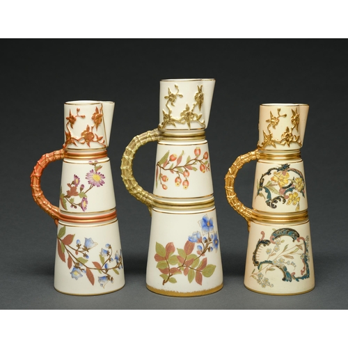 Appraisal: Three Royal Worcester claret jugs and moulded in relief and