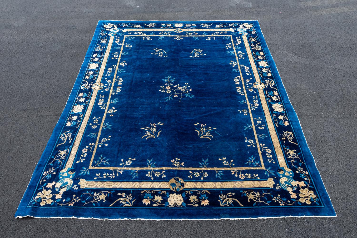 Appraisal: HAND KNOTTED WOOL PEKING STYLE RUG X Hand knotted wool