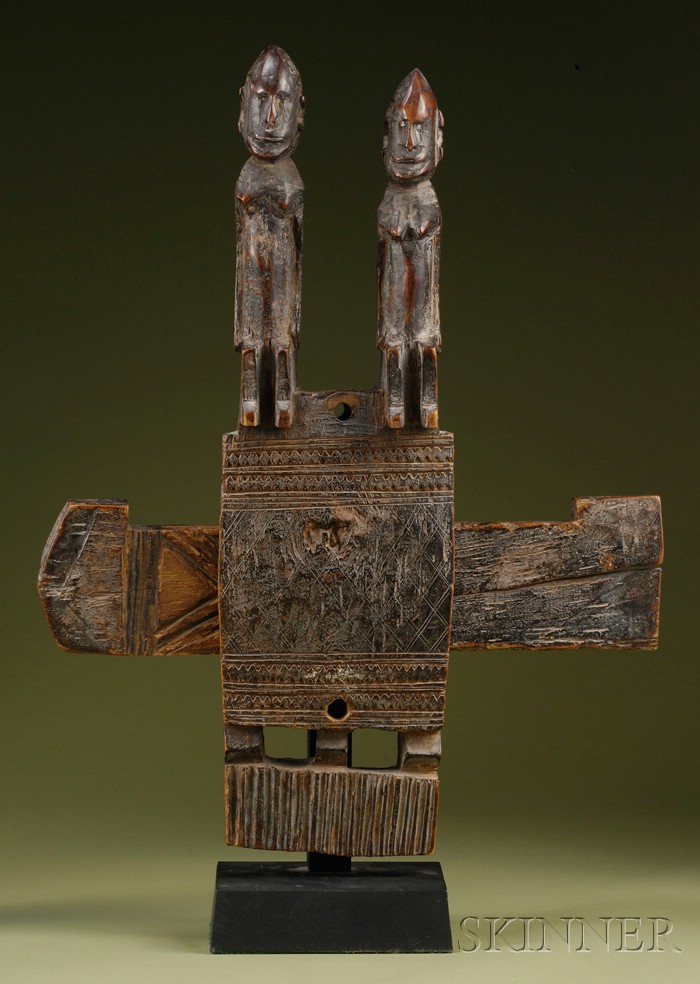 Appraisal: African Carved Wood Lock Dogon Nommo the seated figures with