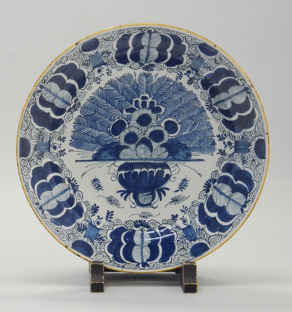 Appraisal: DELFT POTTERY PEACOCK CHARGER Circa In blue and white Signed