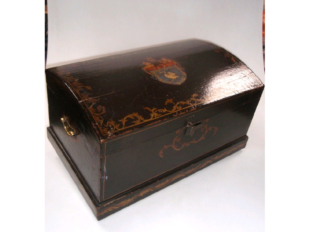 Appraisal: An armorial painted and decorated dome top trunk cm wide