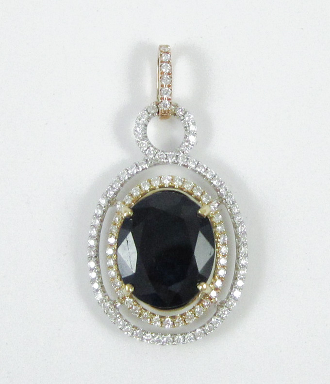 Appraisal: SAPPHIRE DIAMOND AND EIGHTEEN KARAT GOLD PENDANT The k white