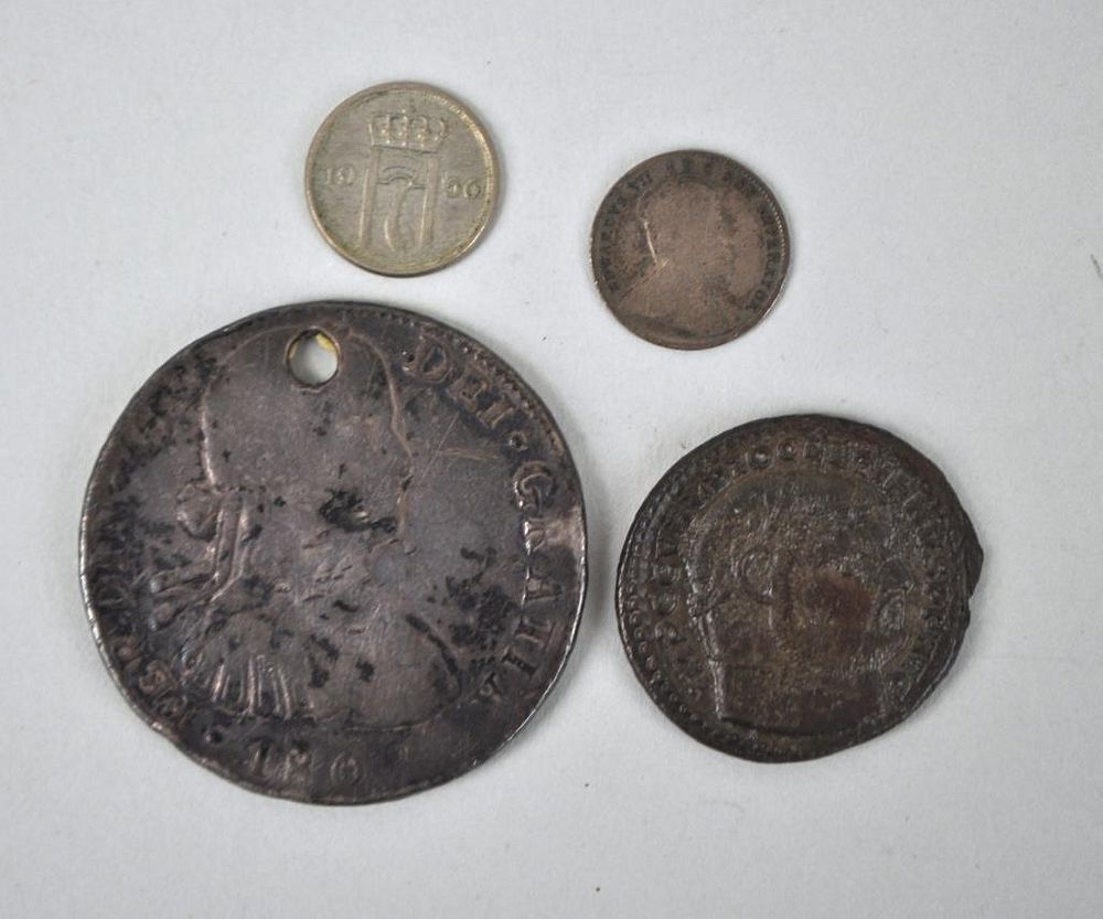 Appraisal: Group Four Foreign Coins comprising Roman style coin Mexican Reales