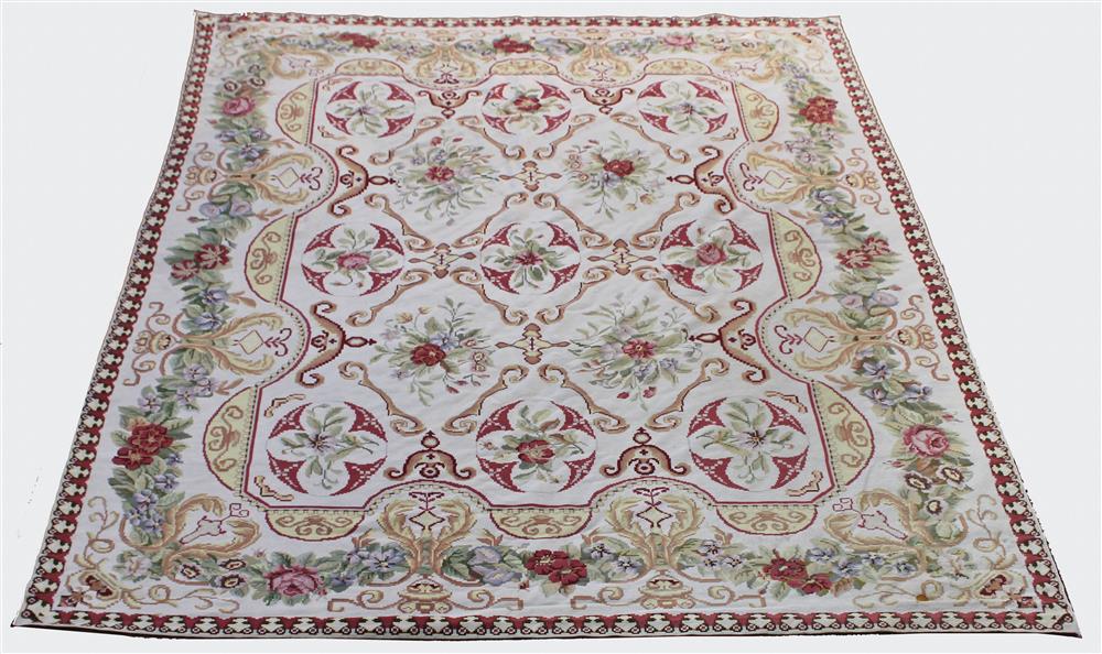 Appraisal: LARGE PORTUGUESE NEEDLEPOINT RUG colors include burgundy pink lavender green