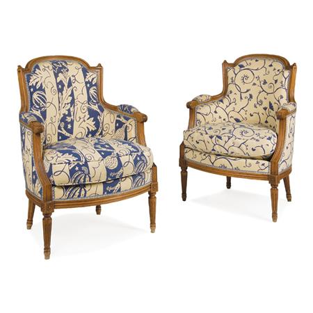 Appraisal: Pair of Louis XVI Style Fruitwood Upholstered Bergeres Estimate -