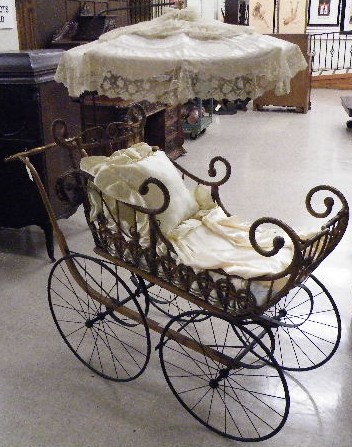 Appraisal: VICTORIAN BABY CARRIAGE WITH PARASOL Heywood Brothers Wakefield Rattan Co