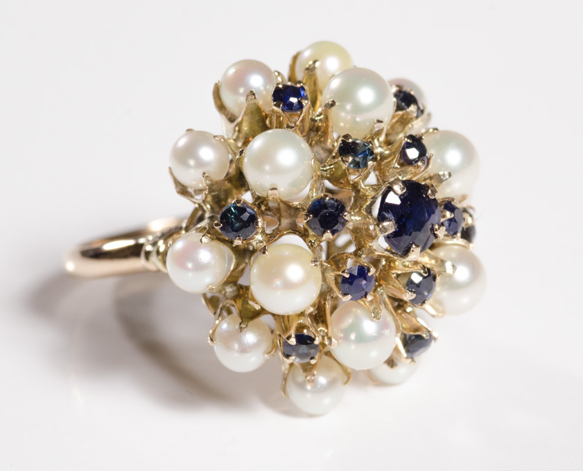 Appraisal: SAPPHIRE PEARL AND FOURTEEN KARAT GOLD RING set with a