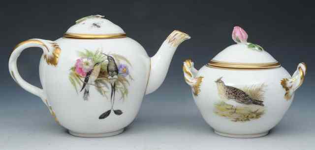 Appraisal: A COPENHAGEN WHITE GROUND PORCELAIN OVOID TEAPOT painted with birds