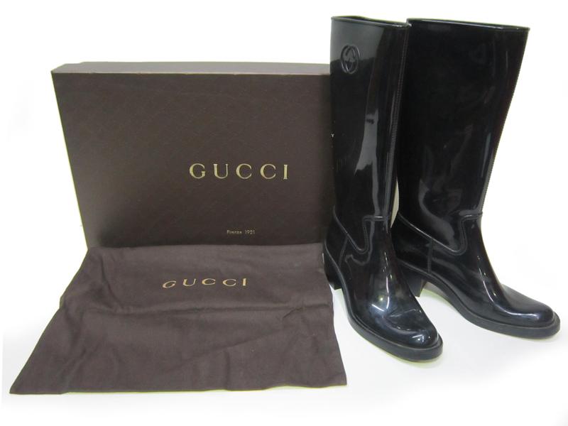 Appraisal: A PAIR OF LADIES GUCCI BLACK GUMBOOTS SIZE EUROPEAN A