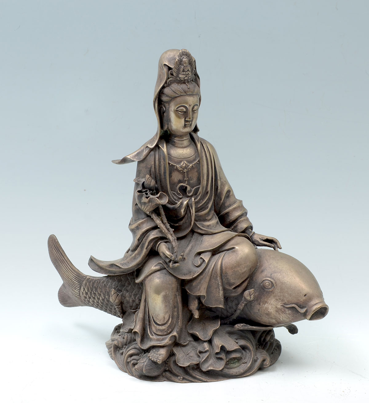 Appraisal: SILVERED BRONZE SCULPTURE OF KWAN YIN ON KOI FISH Nicely