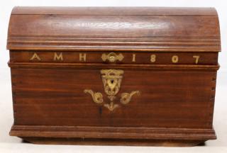 Appraisal: CONTINENTAL DOME-TOP OAK AND MAHOGANY TRUNK TH C H W