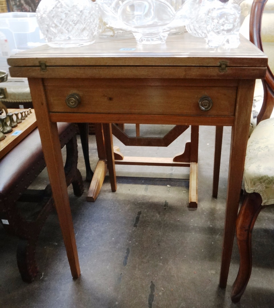 Appraisal: An Edwardian mahogany satinwood crossbanded envelope top card table boxwood