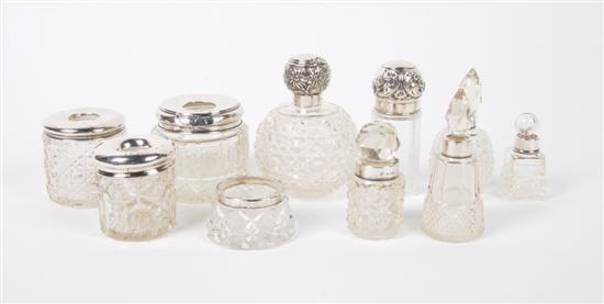 Appraisal: An Assembled Collection of Cut Glass Dressing Set Articles Height