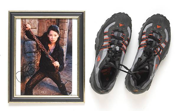 Appraisal: A Lucy Liu signed photograph and pair of sneakers s