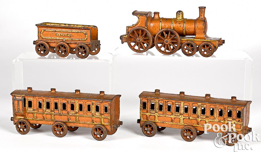 Appraisal: H Wallworks cast iron four-piece floor train H Wallworks cast