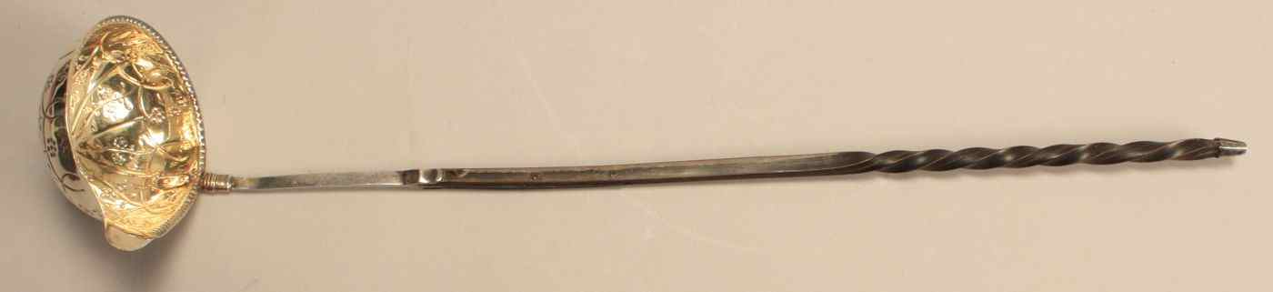 Appraisal: ENGLISH SILVER BRANDY LADLEEarly th CenturyUnmarked With baleen twist-carved handle