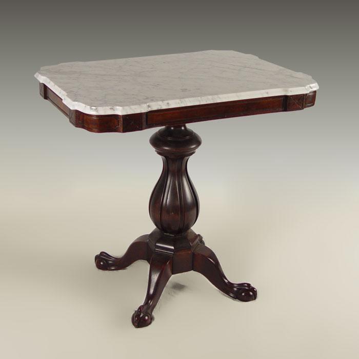 Appraisal: EASTLAKE VICTORIAN MARBLE TOP TABLE White marble top sitting on