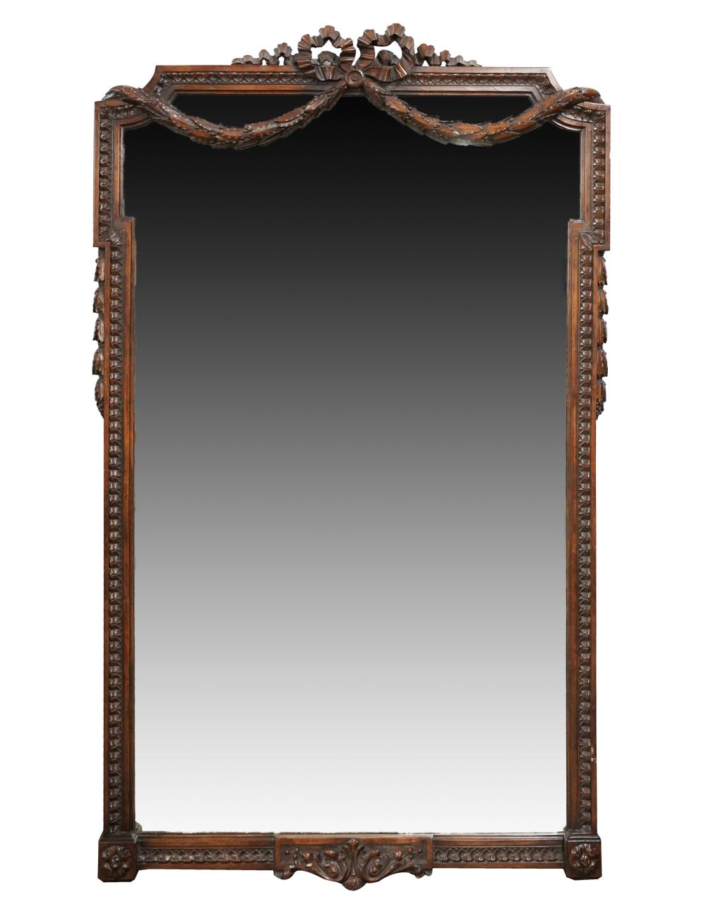 Appraisal: NEOCLASSIC CARVED WALNUT WALL MIRROR th century with flat mirror