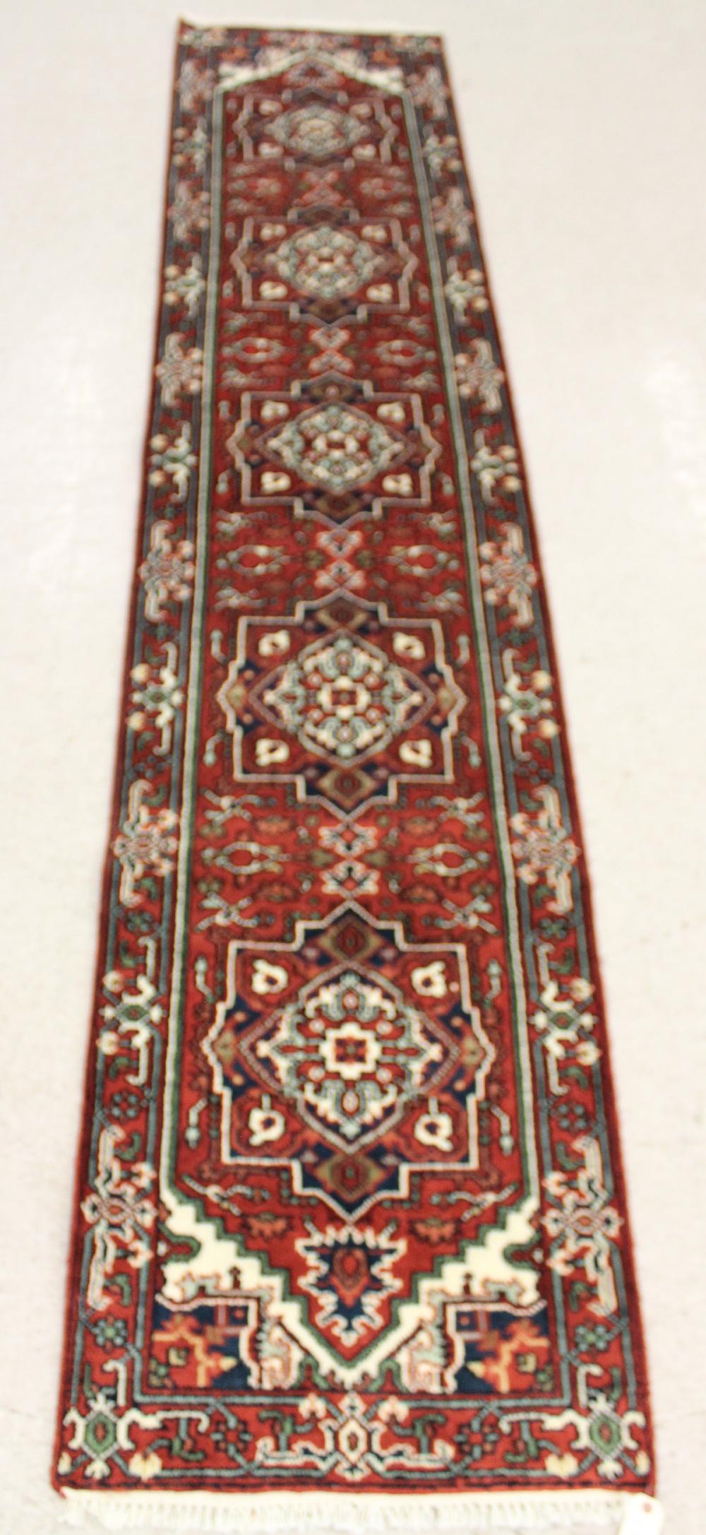 Appraisal: HAND KNOTTED ORIENTAL RUNNER Persian Serab design featuring five geometric