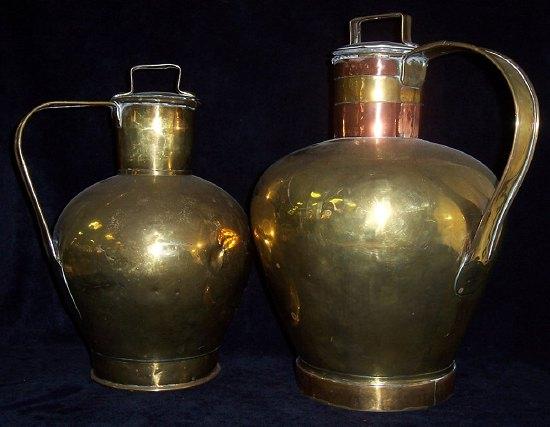 Appraisal: A Dutch brass milk pail and cover the neck with