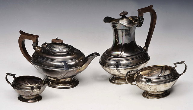 Appraisal: A FOUR PIECE SILVER TEA SERVICE by James Deakin Sons