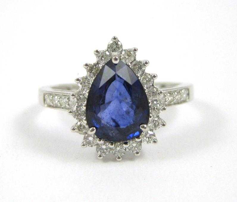 Appraisal: SAPPHIRE DIAMOND AND FOURTEEN KARAT GOLD RING The white gold