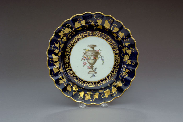 Appraisal: WORCESTER PORCELAIN BLUE-GROUND PLATE CIRCA - Decorated in the atelier