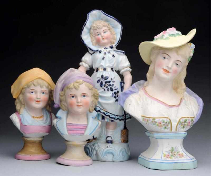 Appraisal: Lot of German Bisque Figures Boy and girl pair in