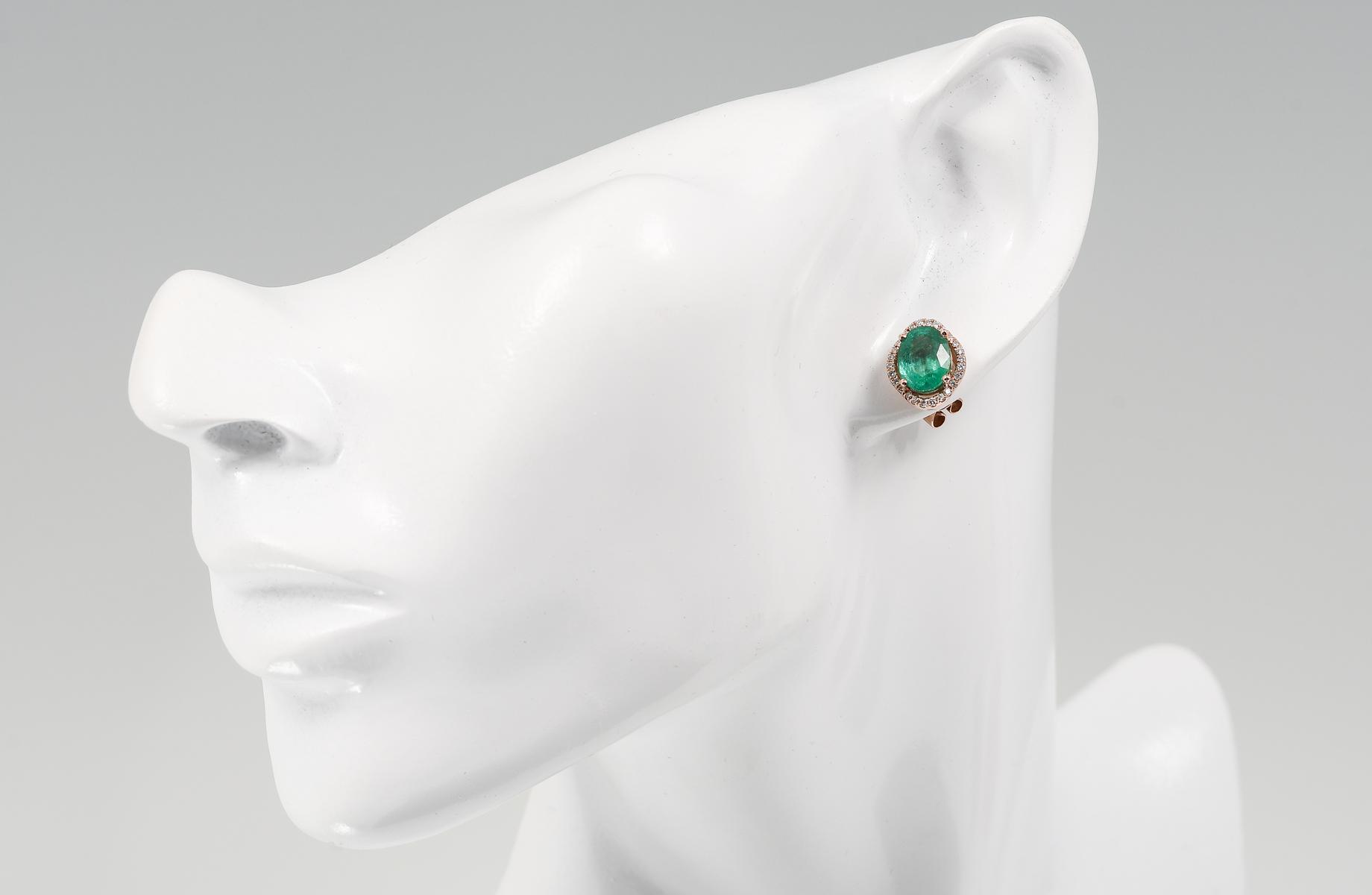 Appraisal: K CTW EMERALD DIAMOND EARRINGS A single oval brilliant cut