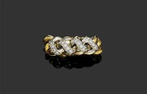 Appraisal: BICOLOR DIAMOND RING White and yellow gold g Decorative chain