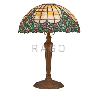 Appraisal: LEADED GLASS LAMP Slag glass with floral decoration on patinated