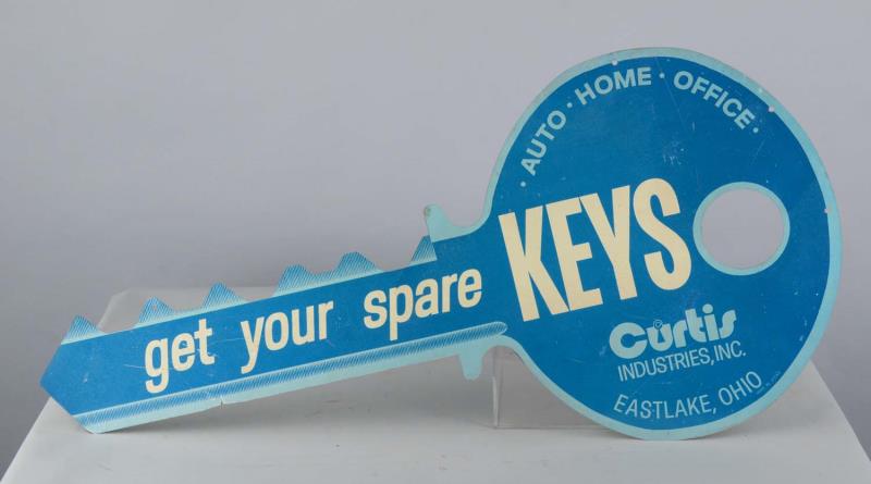 Appraisal: Curtis Keys Die-Cut Tin Double-Sided Sign This tin sign is