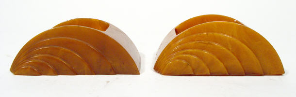 Appraisal: Pair of Art Deco composite Carvacraft ashtrays factory marks to