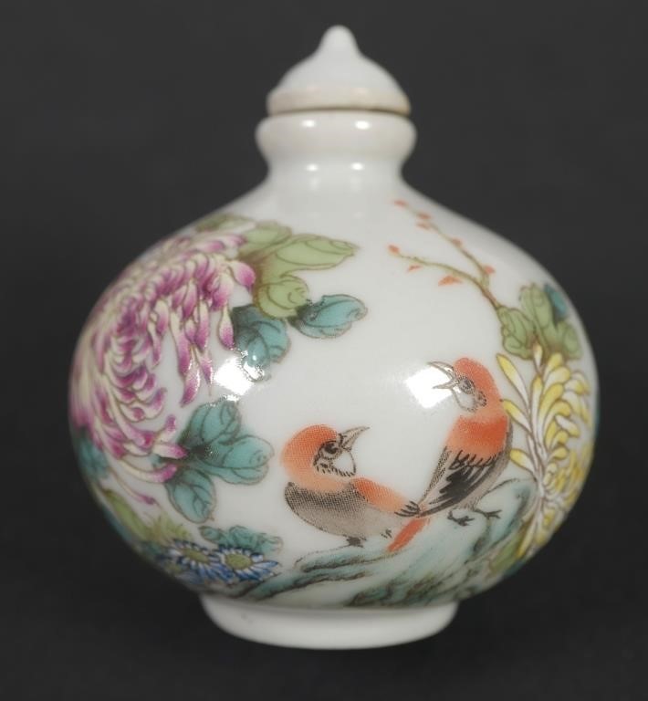 Appraisal: This round ceramic snuff bottle has a painted scene of