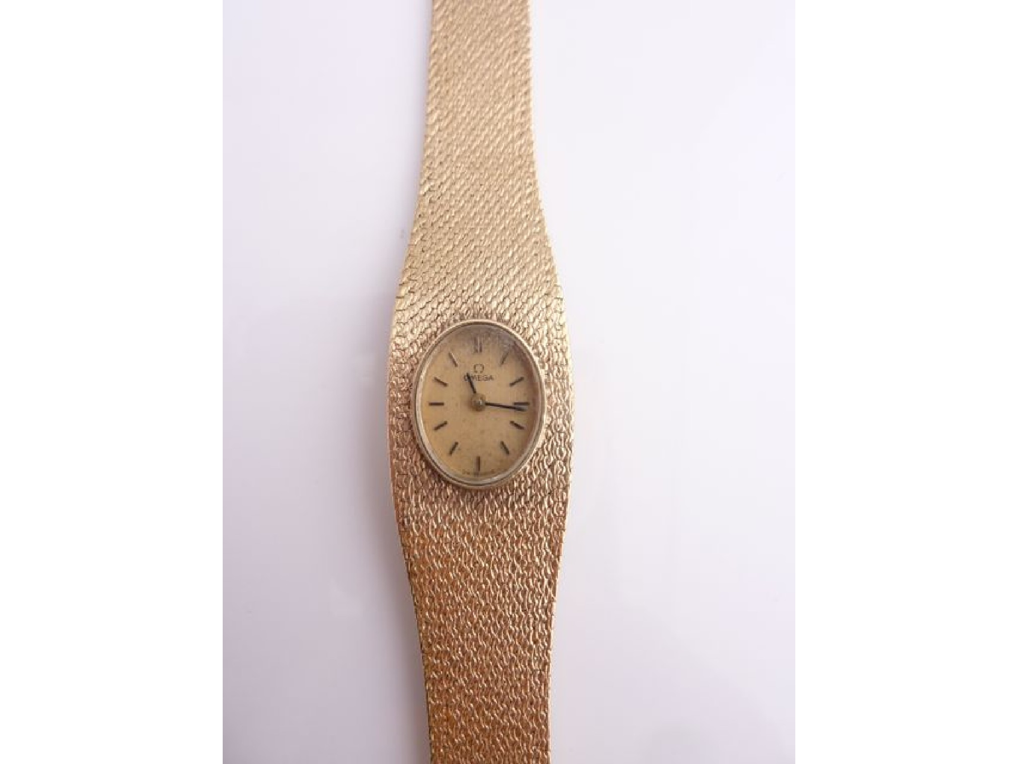 Appraisal: A lady's ct gold wristwatch Omega the oval dial with