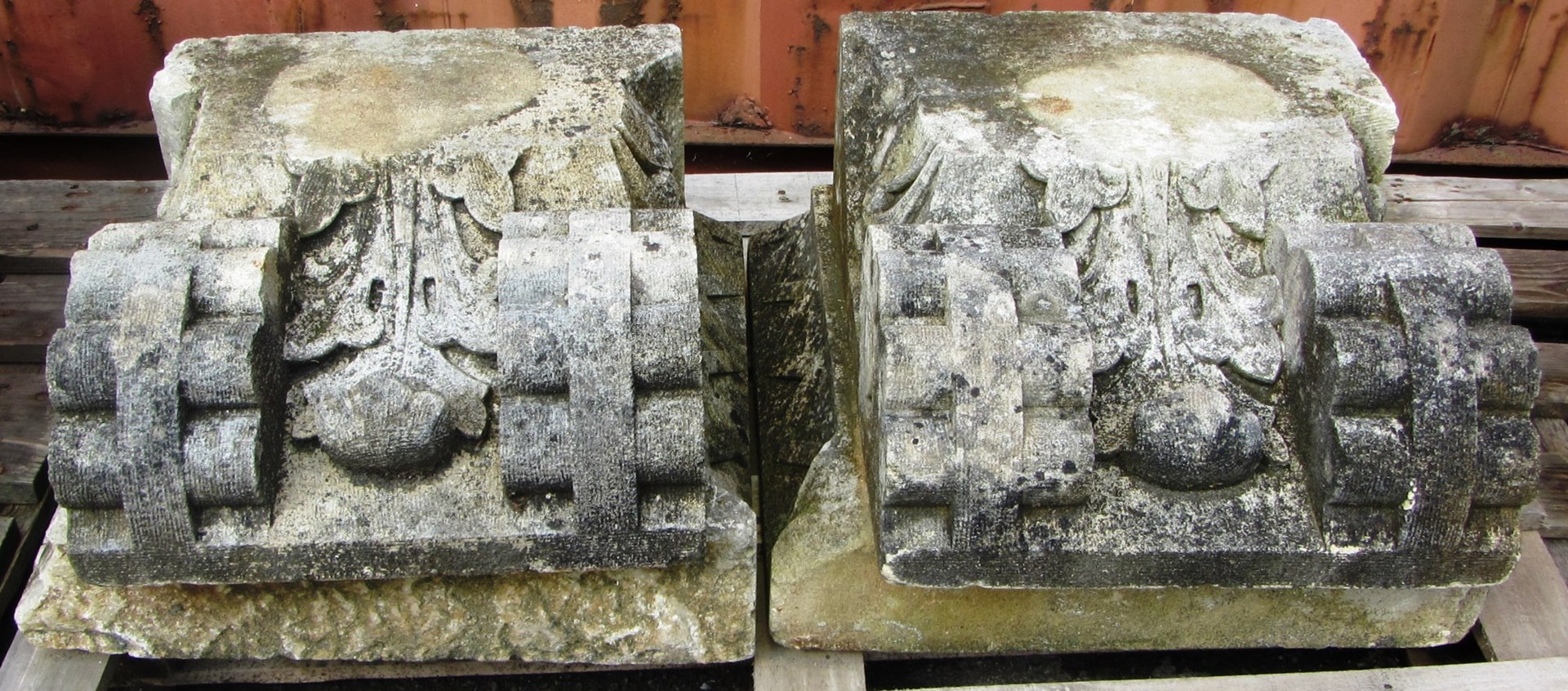 Appraisal: A pair of carved stone Gothic design capitals on flared