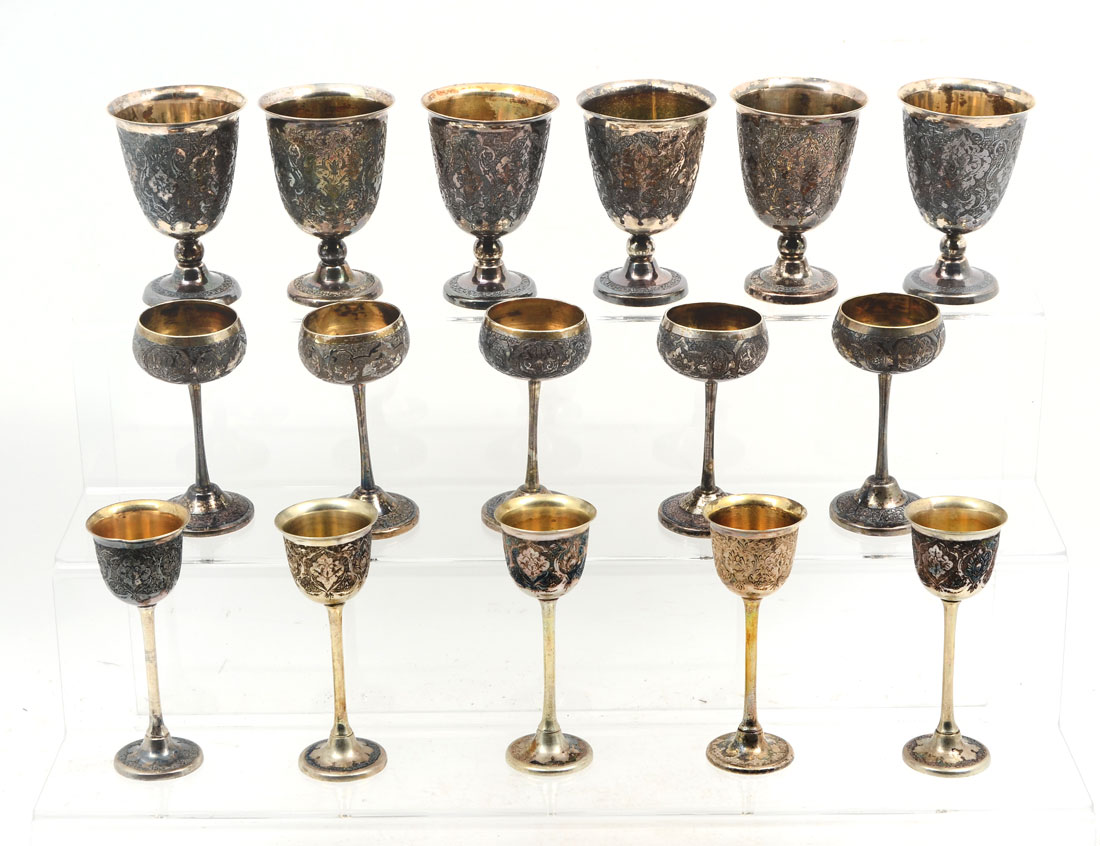 Appraisal: COLLECTION OF ENGRAVED MIDDLE EASTERN SILVER CUPS An assembled collection