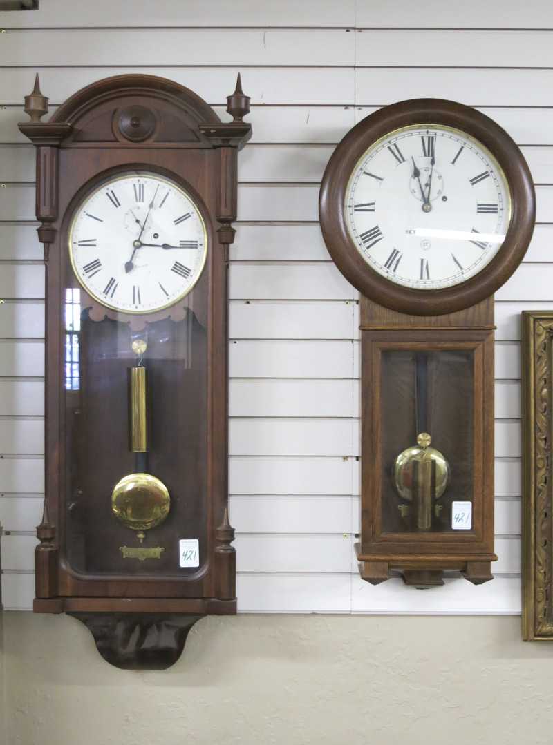 Appraisal: TWO SETH THOMAS ANTIQUE REPRODUCTION WALL CLOCKS oak cased Regulator