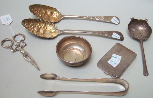 Appraisal: Silver comprising two berry fruit serving spoons London and Dublin